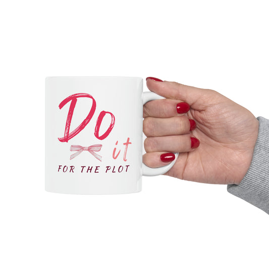 Do it for the plot pink quote on a white coffee mug. Shades of pink and red text with a pink watercolor bow. Y2k girly, girl or soft girl aesthetic.