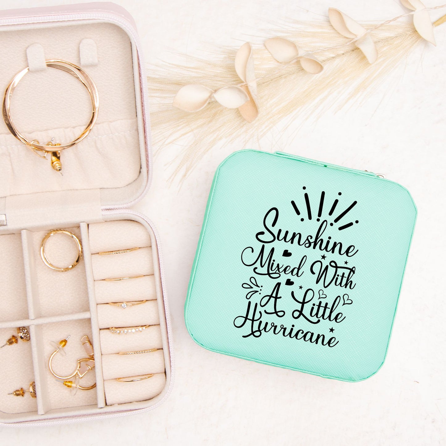 Sunshine mixed with a little hurricane travel jewelry box. Black quote on a teal organizer. Inside has felt and organizers for earrings, rings and necklaces.