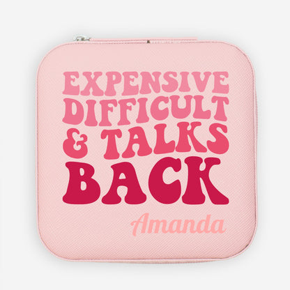 Expensive difficult & talks back in a retro wavy monochromatic font. A pink faux leather travel jewelry organizer with a custom name and funny quote.