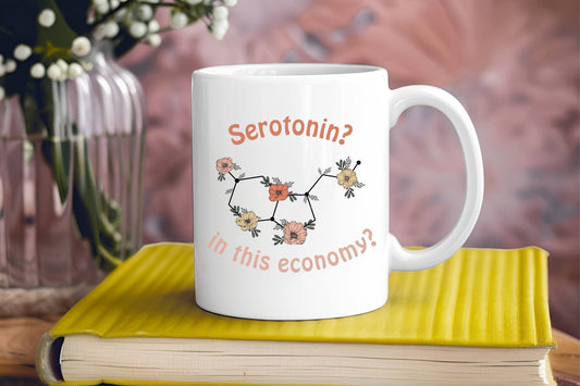 Serotonin? In this economy? Funny white ceramic coffee mug. Serotonin molecule with vintage, retro colored flowers.